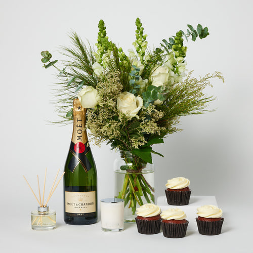 Bouquet of flowers, Moet champagne bottle, and cupcakes gift set